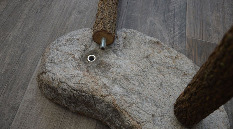 Didgeridoo stand in stone and wood